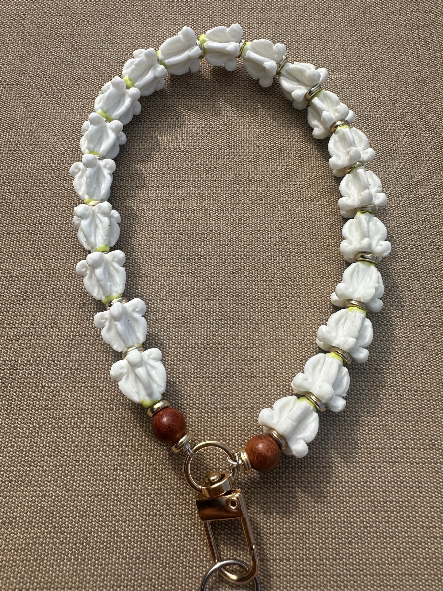 Handcrafted Flower Phone Charm: Hawaiian Lei Wrist Strap