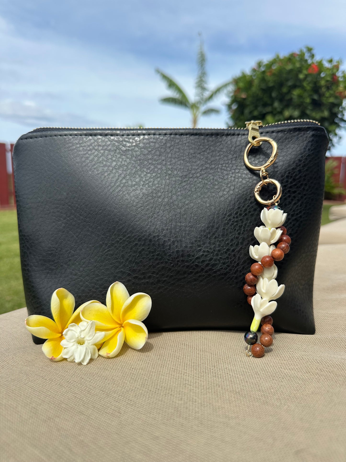 Hawaiian Lei Bag Chain – Sandalwood Beads with Island Flower Charm