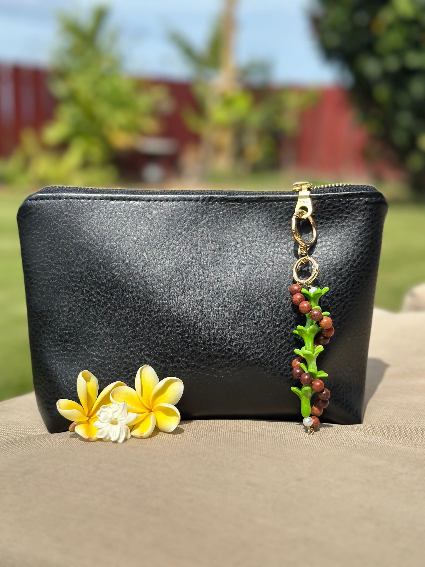 Hawaiian Lei Bag Chain – Sandalwood Beads with Island Flower Charm