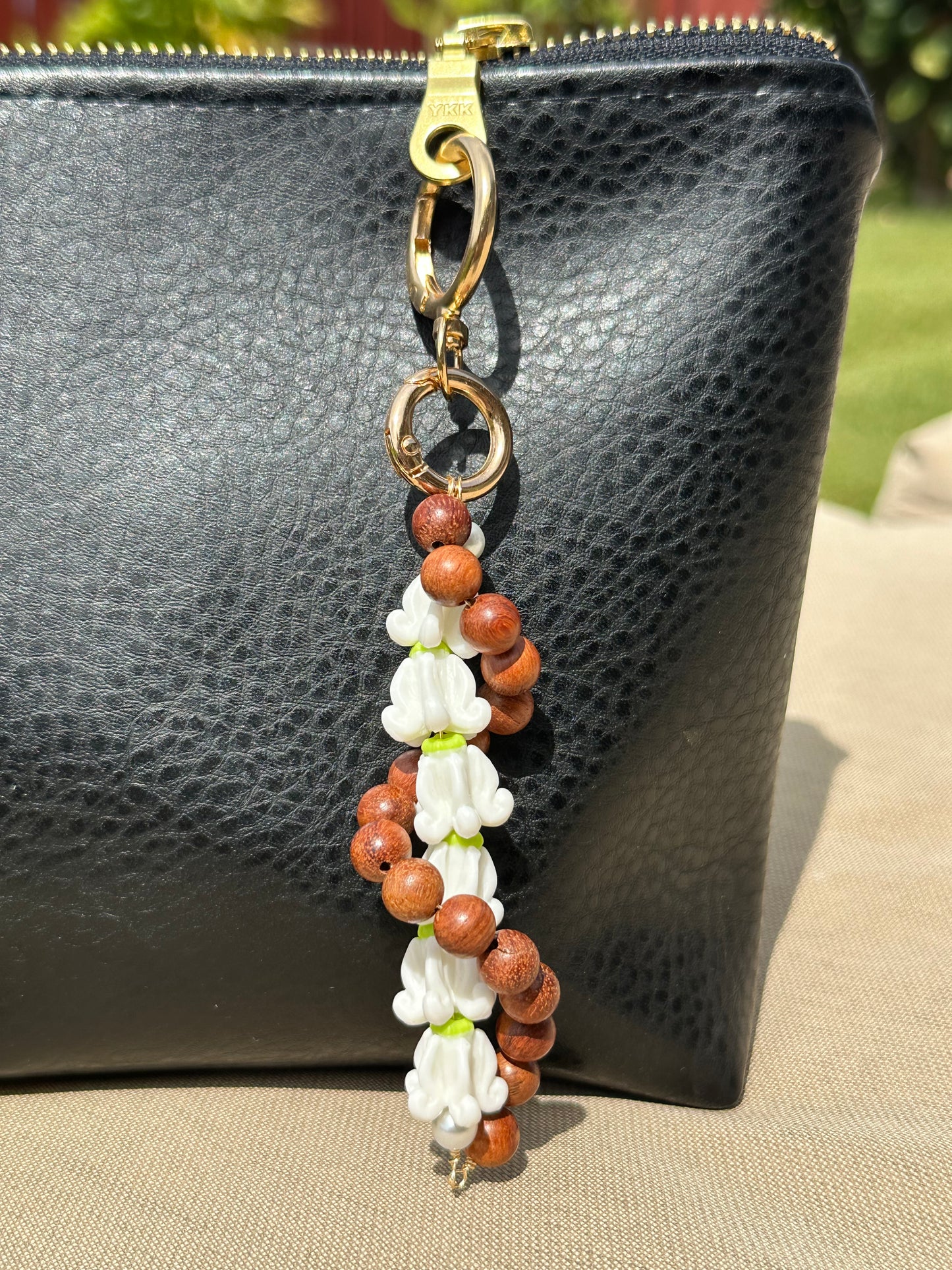 Hawaiian Lei Bag Chain – Sandalwood Beads with Island Flower Charm