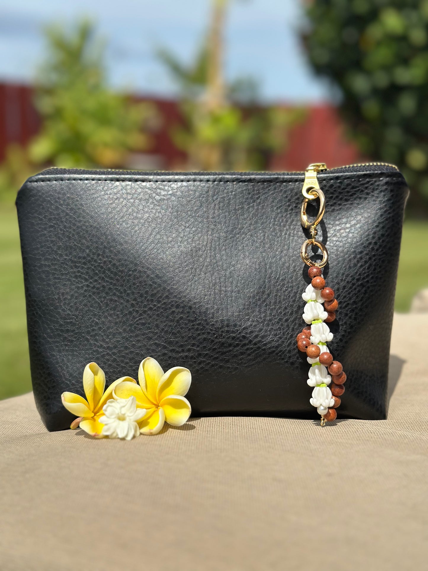 Hawaiian Lei Bag Chain – Sandalwood Beads with Island Flower Charm