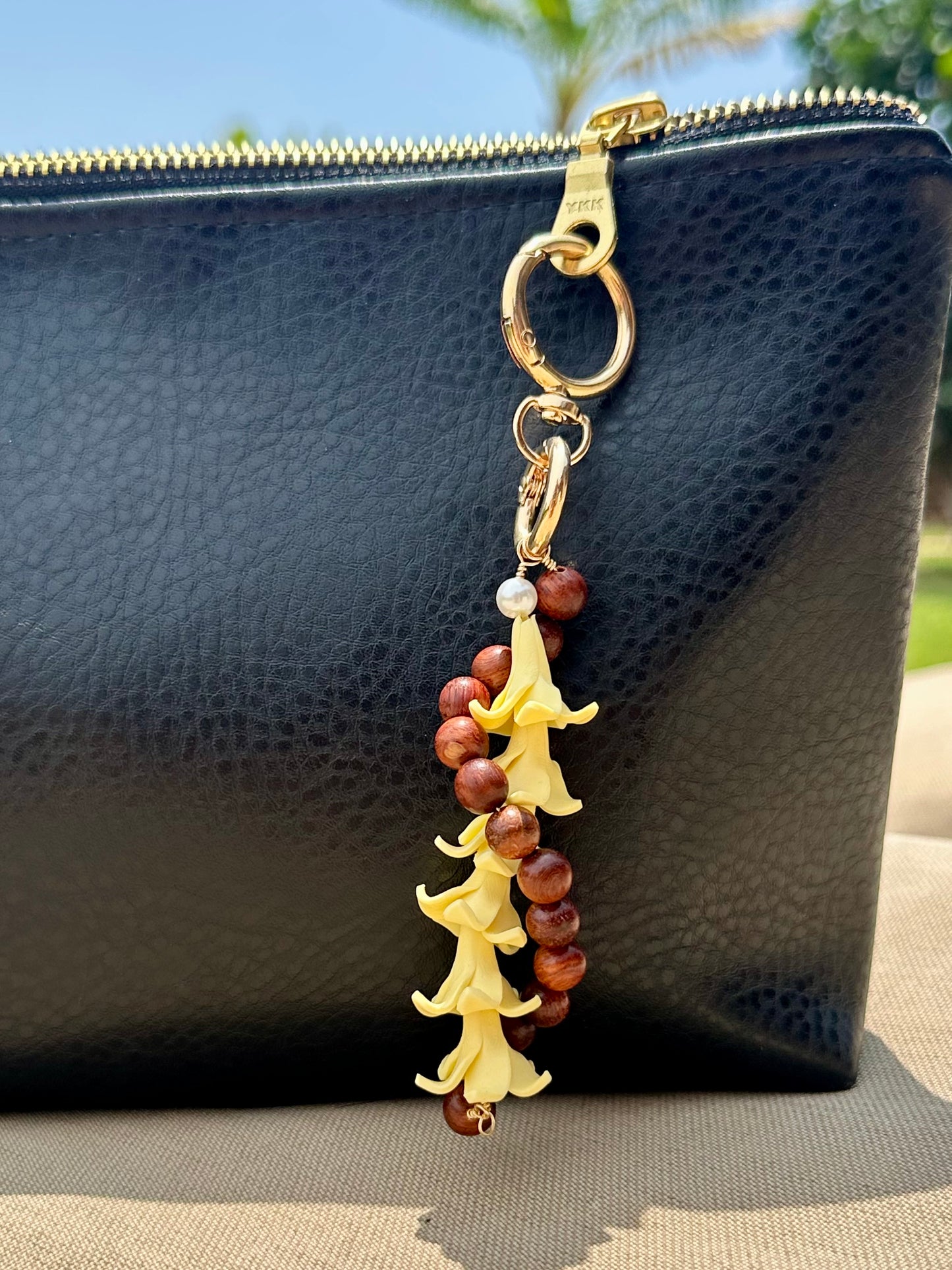 Hawaiian Lei Bag Chain – Sandalwood Beads with Island Flower Charm